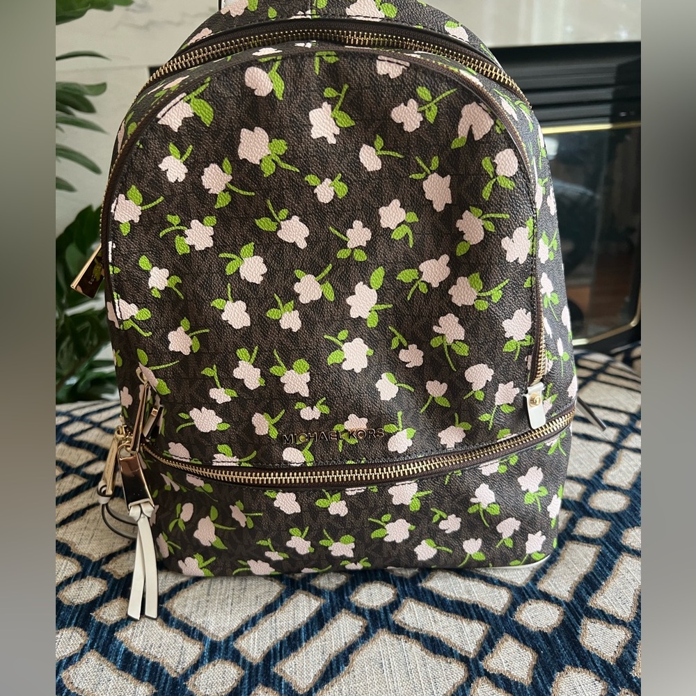 This is a Michael Kors backpack.